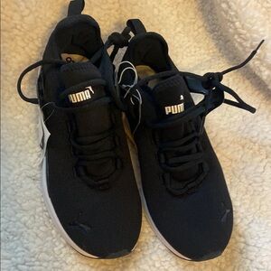 Puma Black Sneakers. New with tags size 8.5 wide soft foam